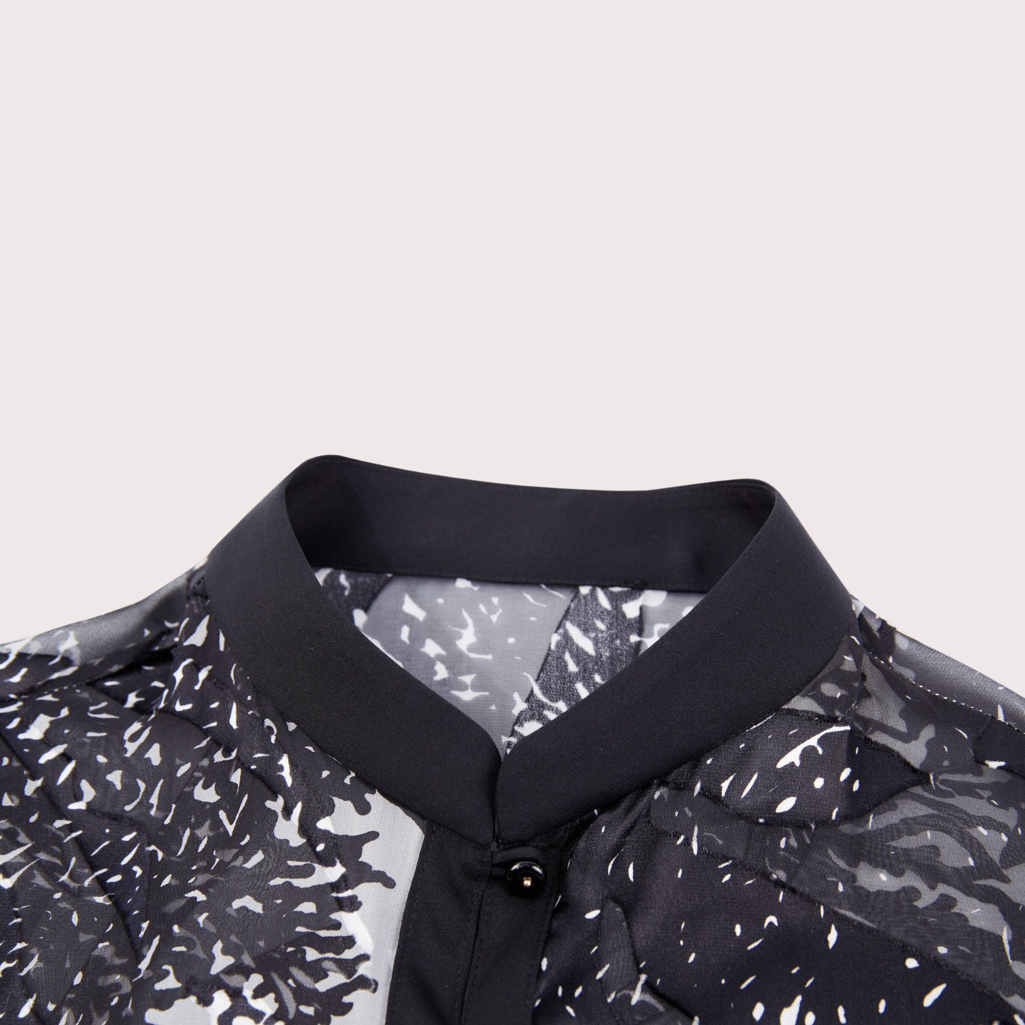 closeup of the collar detail on a burnout silk shirt