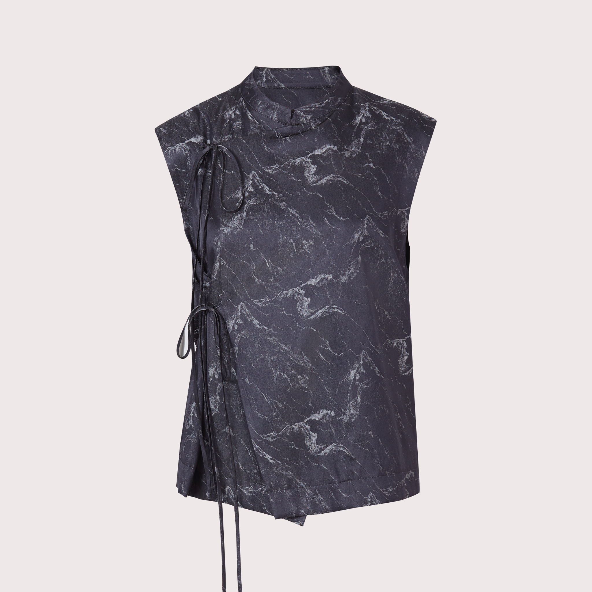 a silk vest on grey background