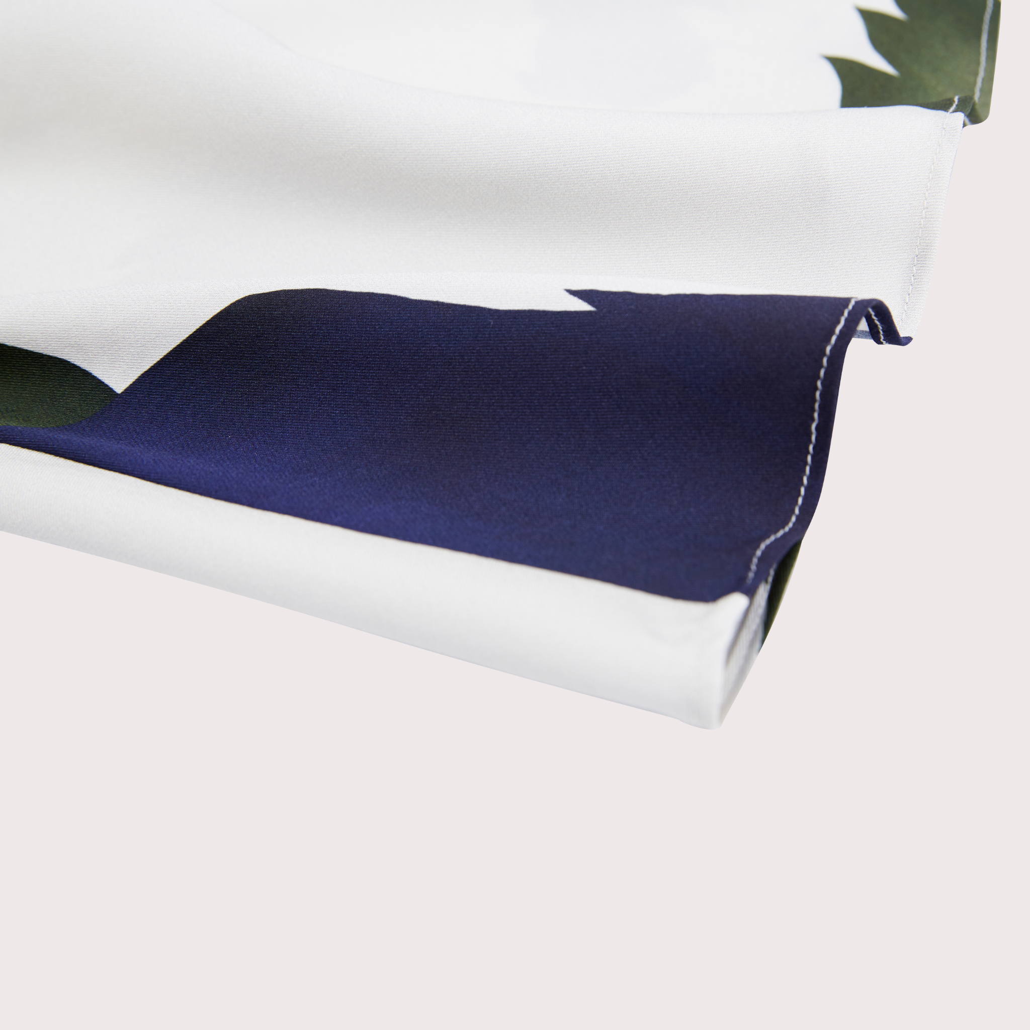 closeup of the seam detail on a wrap front blouse