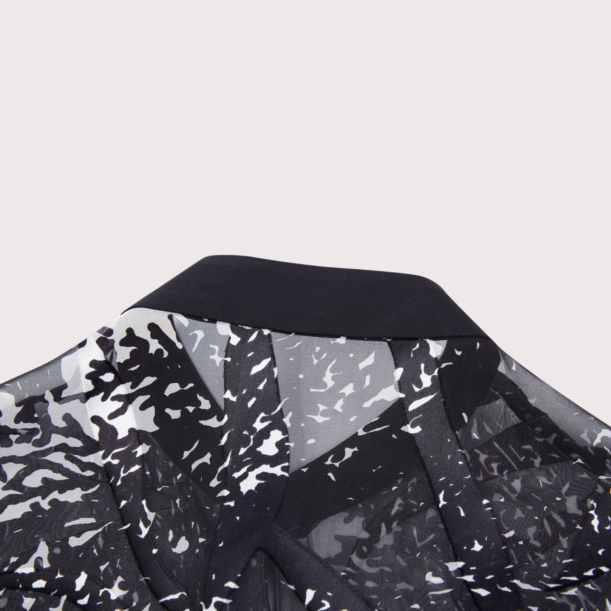 closeup of the collar detail on a burnout silk shirt