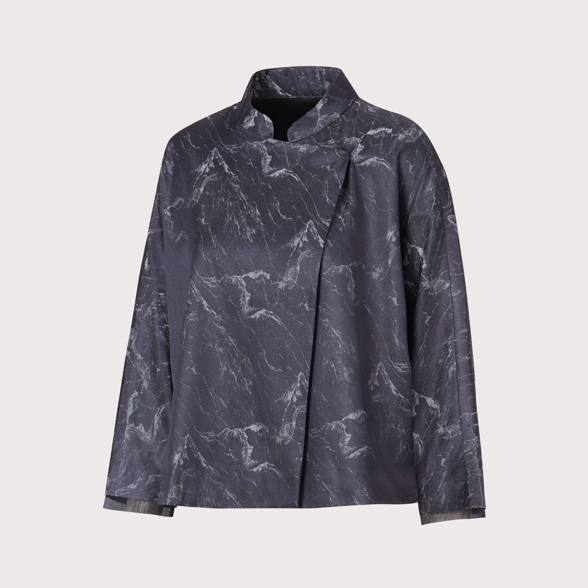 a black silk jacket on grey background